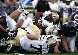 the struggle of American football players
