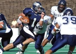 clash of players in american football on the pitch