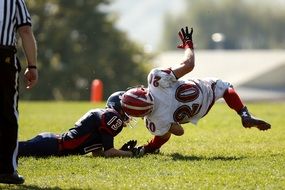falling down american football player