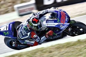 blue motorcycle on the track