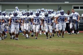 american football team on field