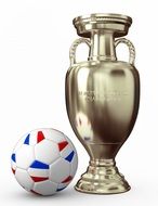 soccer ball near the cup