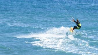 Kitesurfing or Kiteboarding