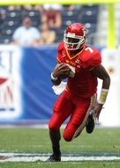 american football player in red uniform