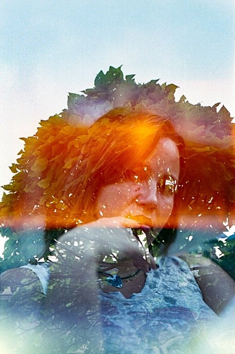 transparent portrait of a girl on the background of a tree