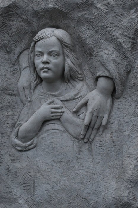 image of a child on a mourning stone