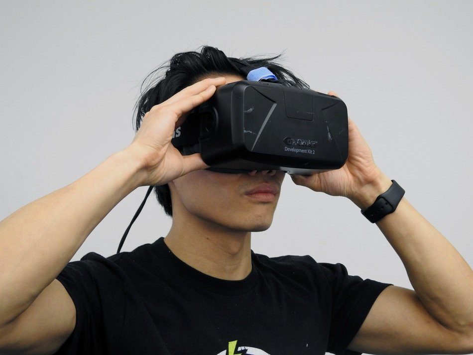 asian man in virtual headset