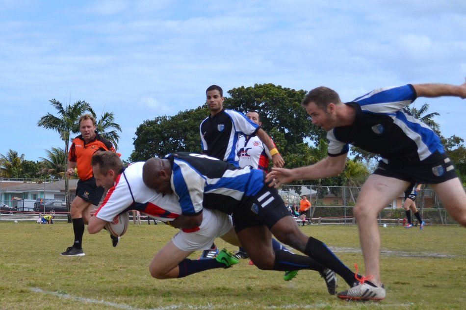 strong athletes focused playing rugby