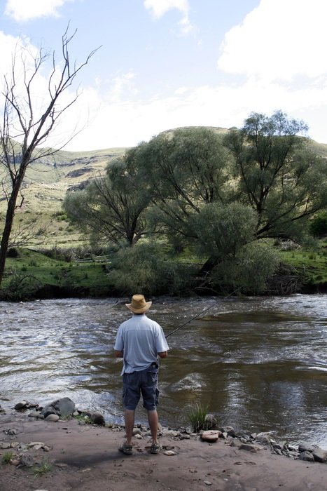 fisherman on a creek in south africa