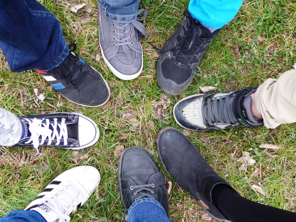 teenagers feet on the lawn