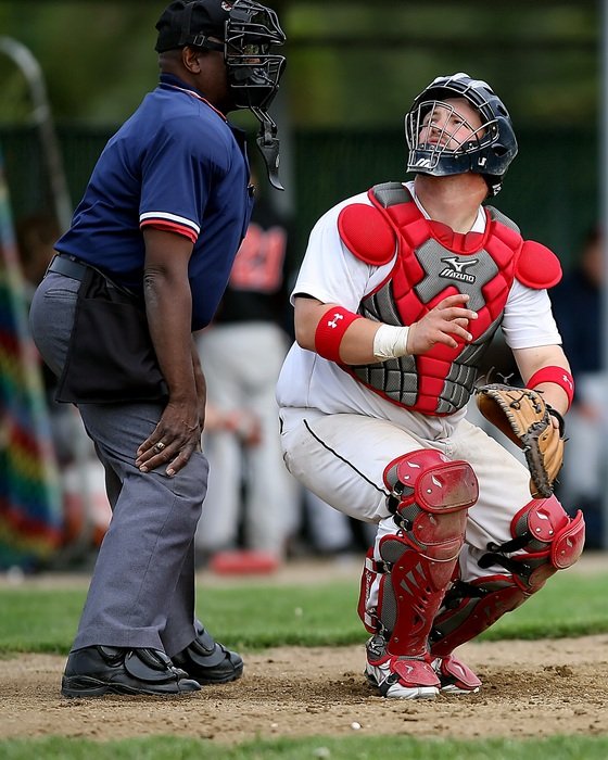 baseball catcher in action on a competition