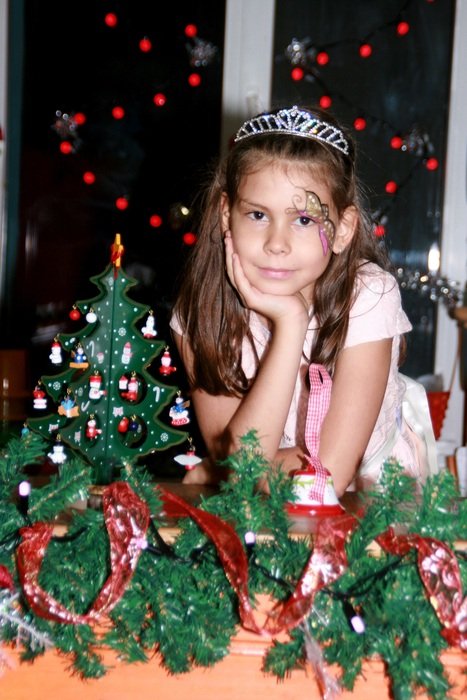 portrait of Girl and Christmas Decorations