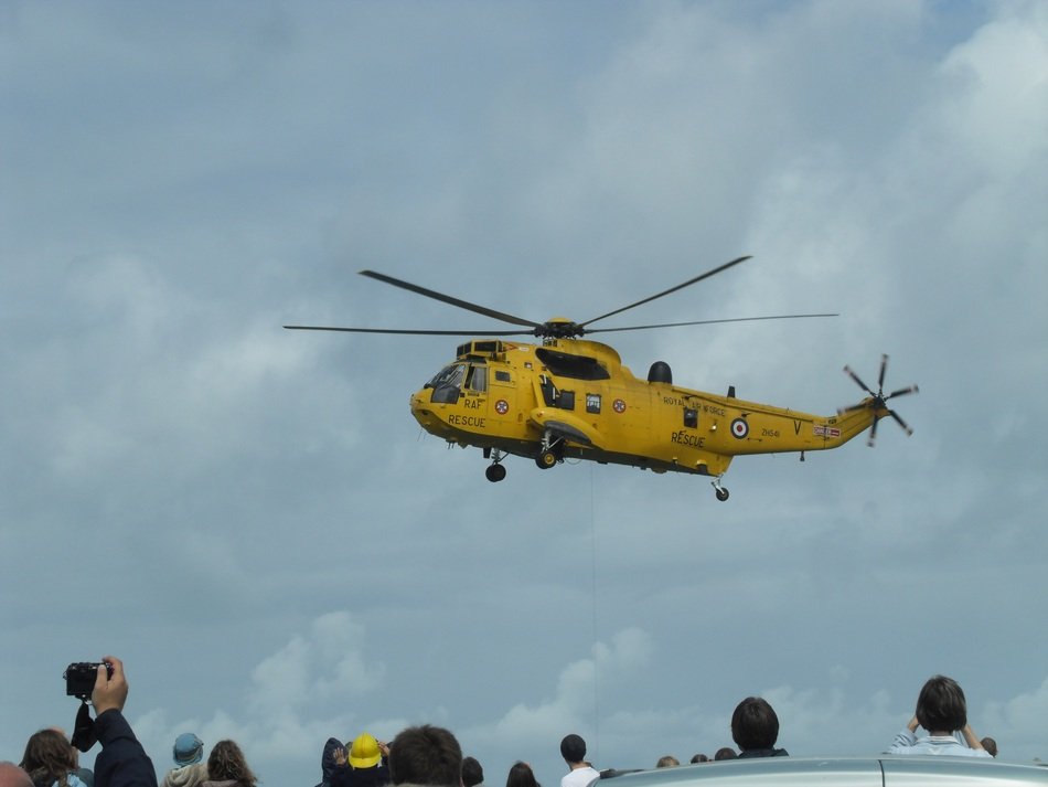 yellow helicopter near the ground