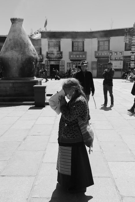 man in prayer in the square