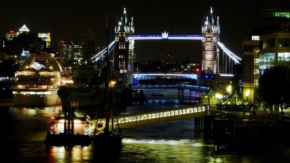night illumination of the Tower Bridge over the Thames in London, England