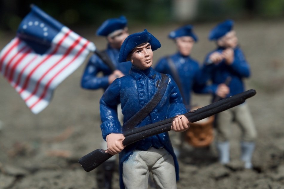 toy soldiers of the allied army on blurred background