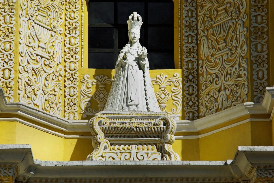 statue near a temple in guatemala