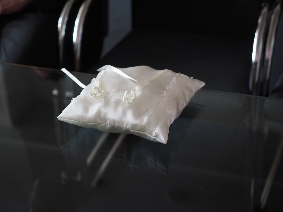 white ring pillow on the table