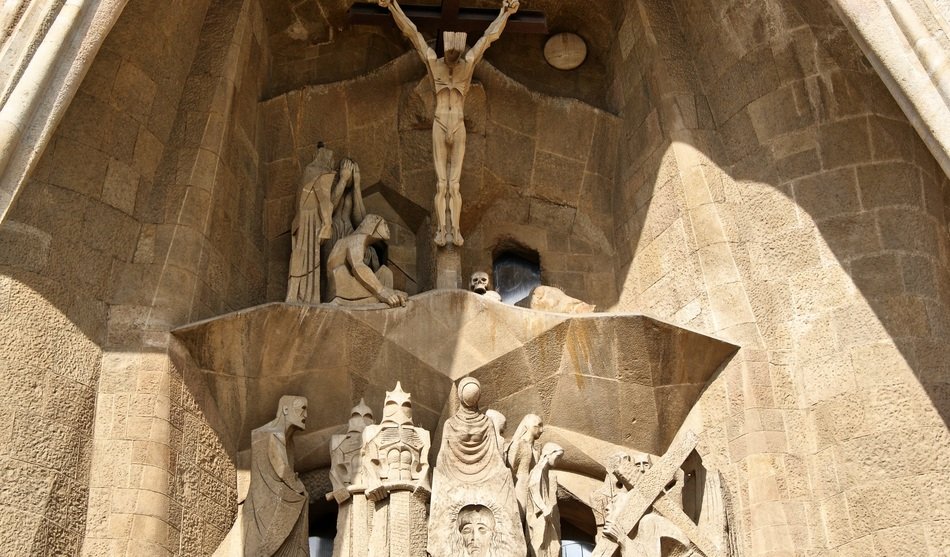historic stone figures on the facade of sagrada familia in barcelona