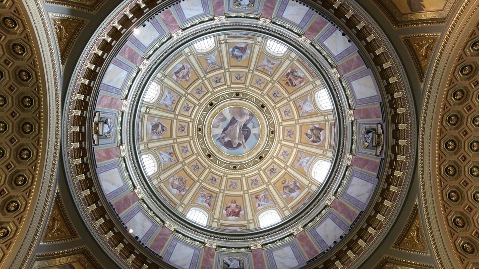 beautiful stained glass window on the ceiling in the church of St. Stephen