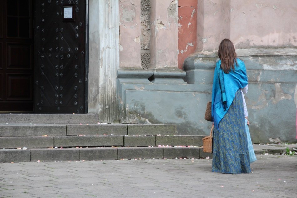woman near the entrance to the church