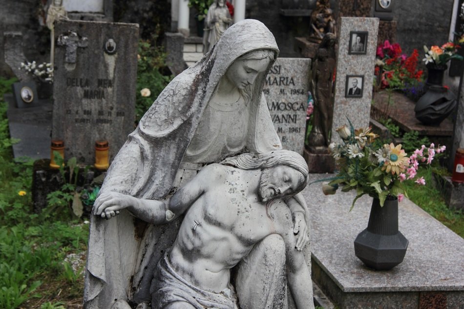 Cemetery with the statue of Jesus in Italy