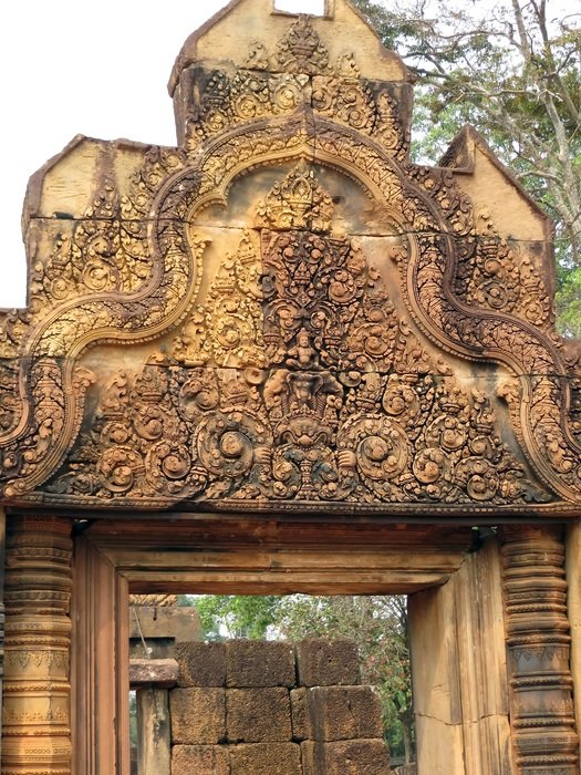 old carved pediment of the temple in Angkor