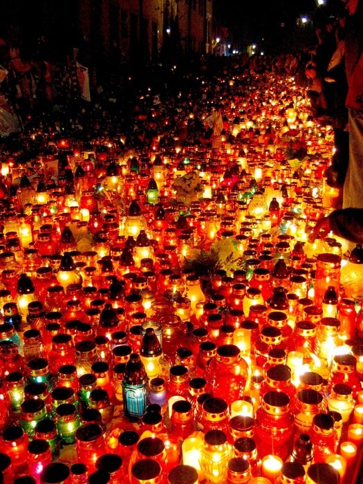 The lots of lighting candles in Krakow