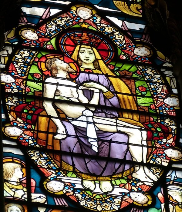 Stained glass with Maria in the church