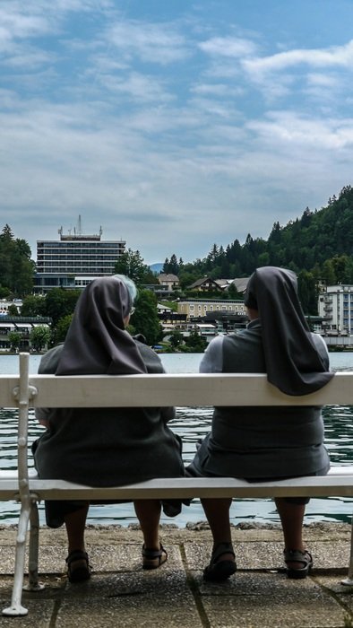 Church sisters on a bench in Slovenia