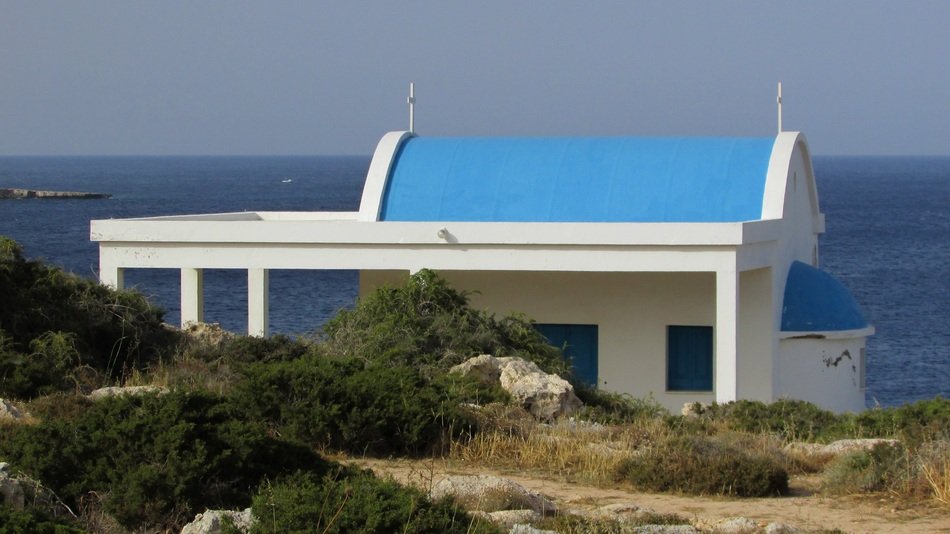 blue and white church in Ayii Anargiri