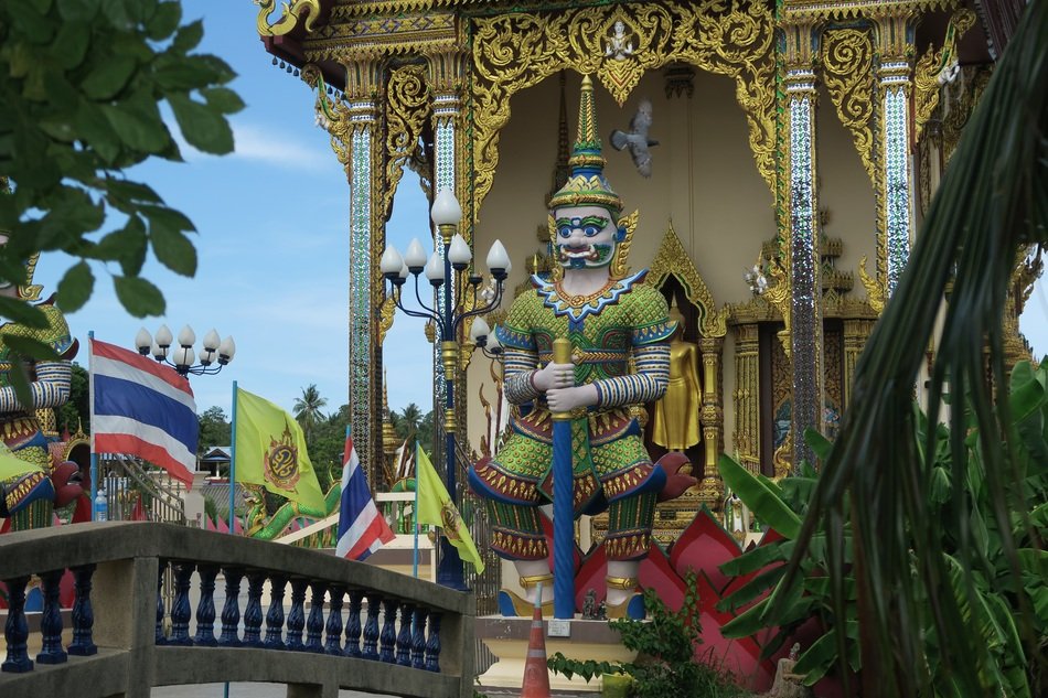 colorful big figure in a temple on the island of Koh Samui