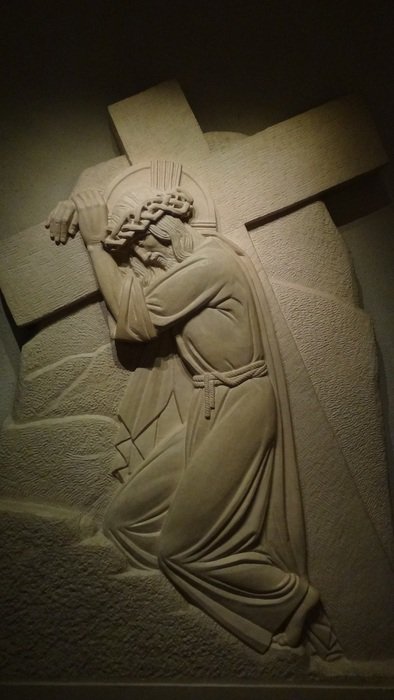 Jesus with cross on shoulder, relief