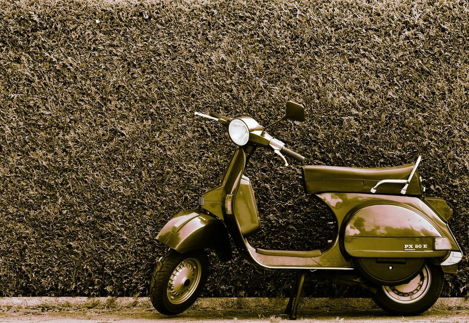 black and white picture of motor scooter
