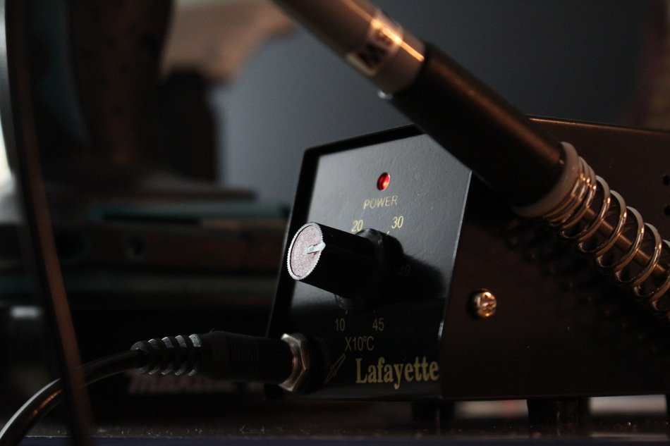 black soldering iron on the table