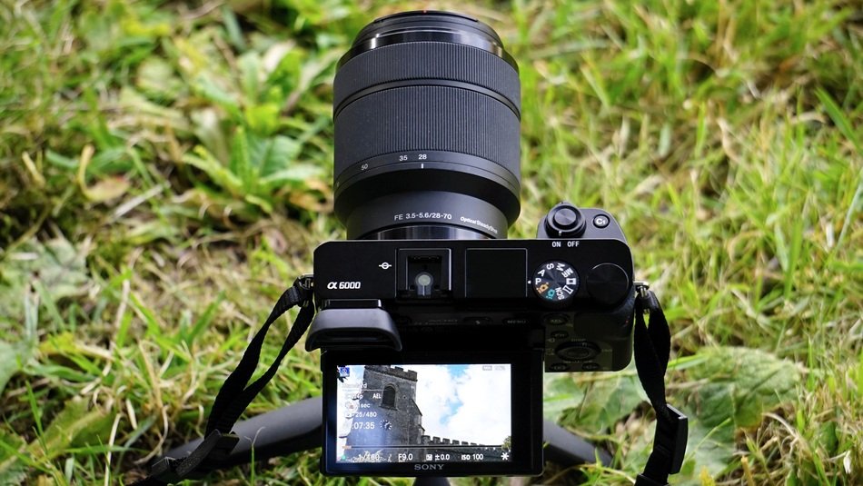 digital camera on green grass