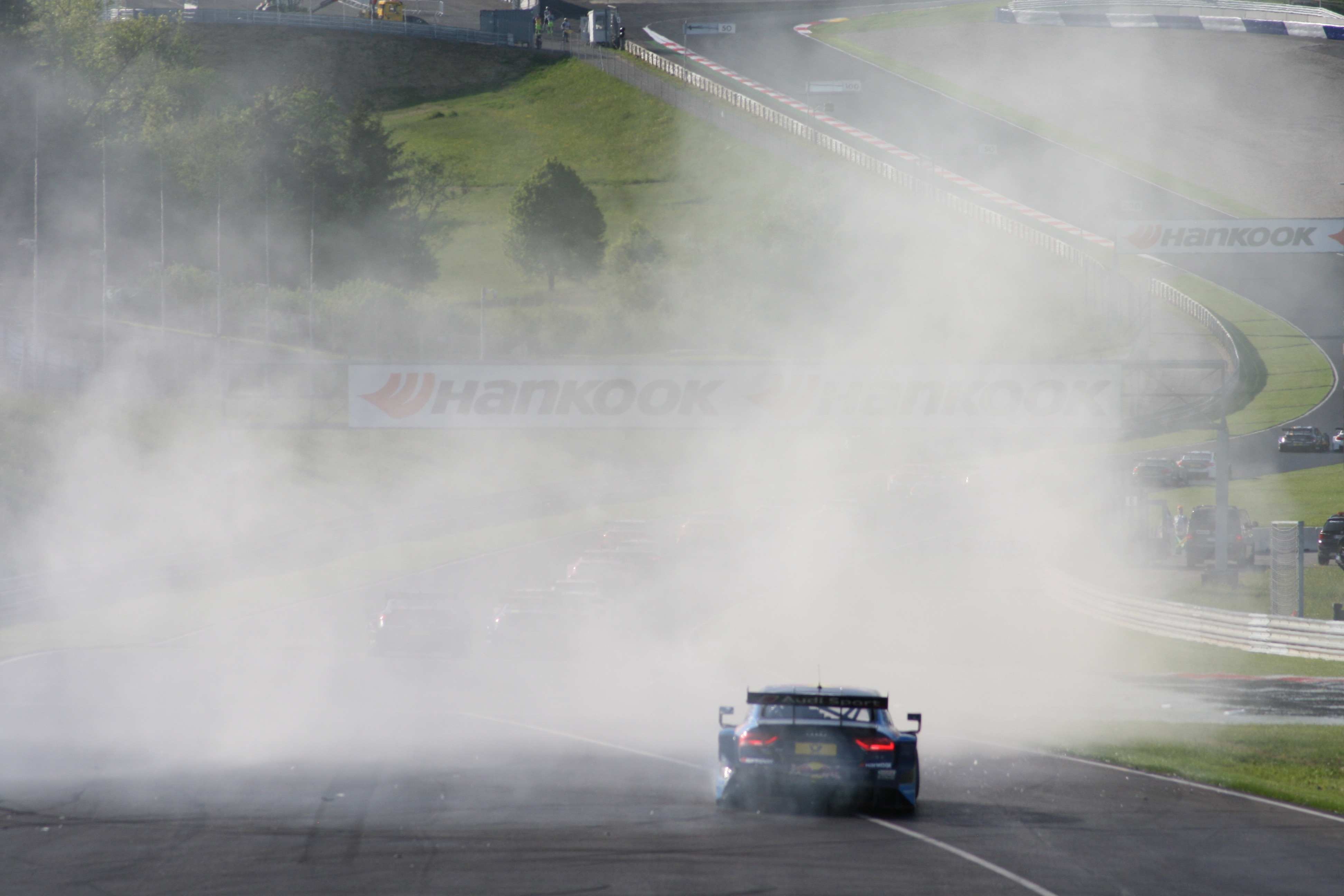 Smoke on the road in a car race free image download