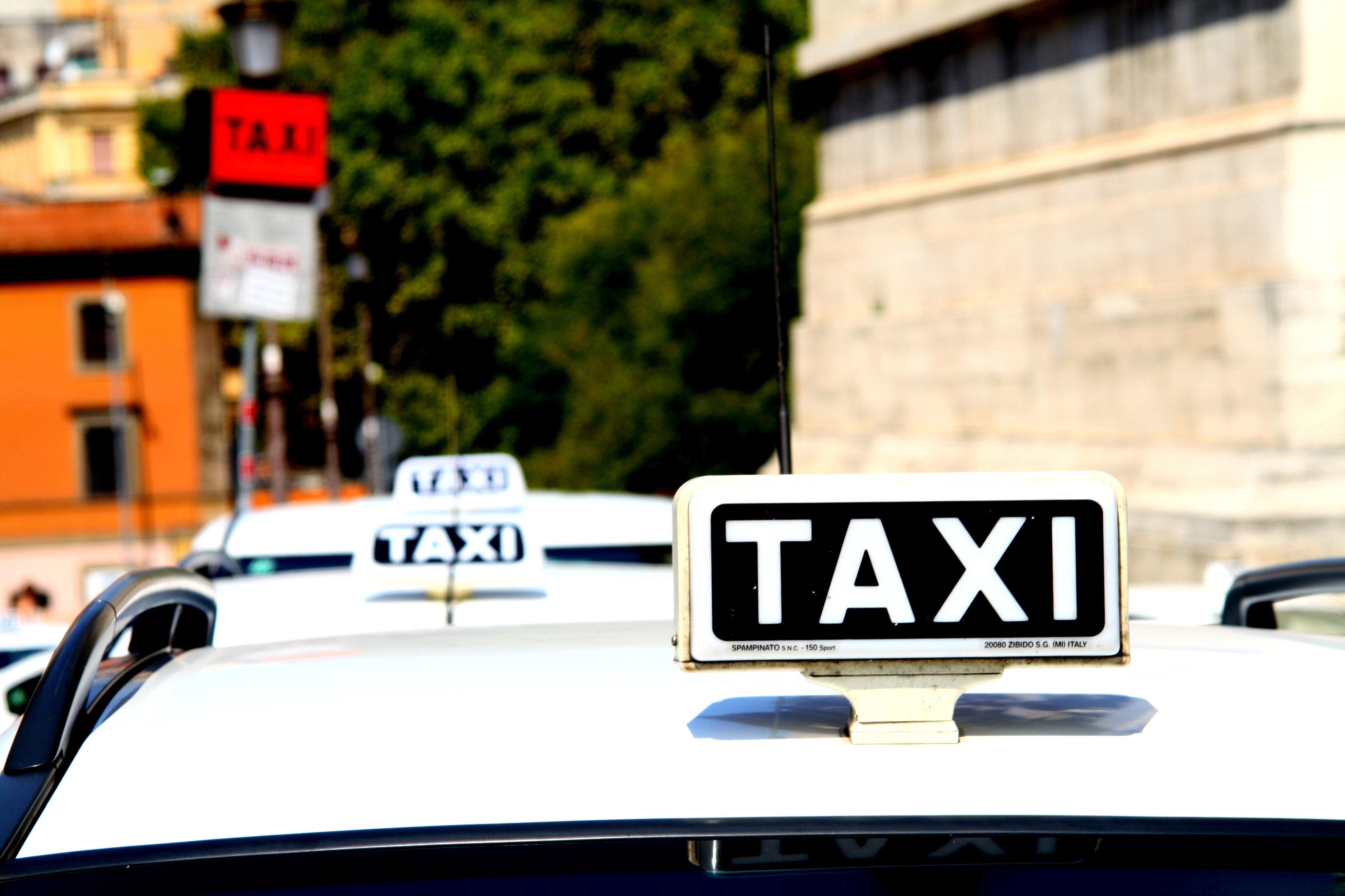 White roofs of Taxi cabs with signs, italy, Rome free image download