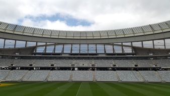 football stadium with green field