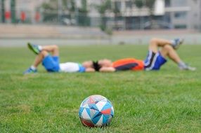 soccer players on the grass on the football field