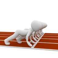 figures of athletes at the start