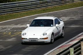 white sports car on the track