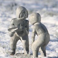 figures of people from gray stone