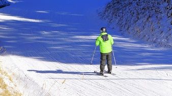 skier on a flat track on a sunny day