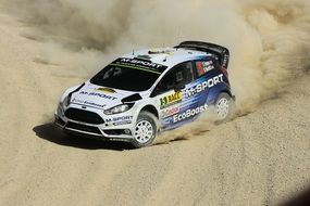 car on the sand in the rally