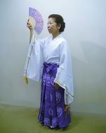 Japanese dance in long-sleeved kimono