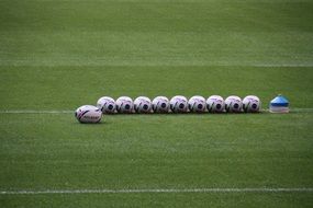 Rugby balls on the green stadium, uk, england, wembley