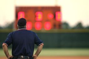 basketball coach on the background of the scoreboard