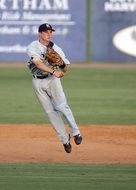 Baseball Player in a jump