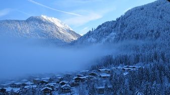panoramic view of a village in a valley in the snowy mountains in Finkenberg